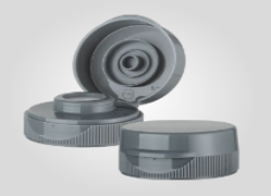 How is the leak-proof and drip-proof function of Silicone Valve Flip Top Cap achieved?